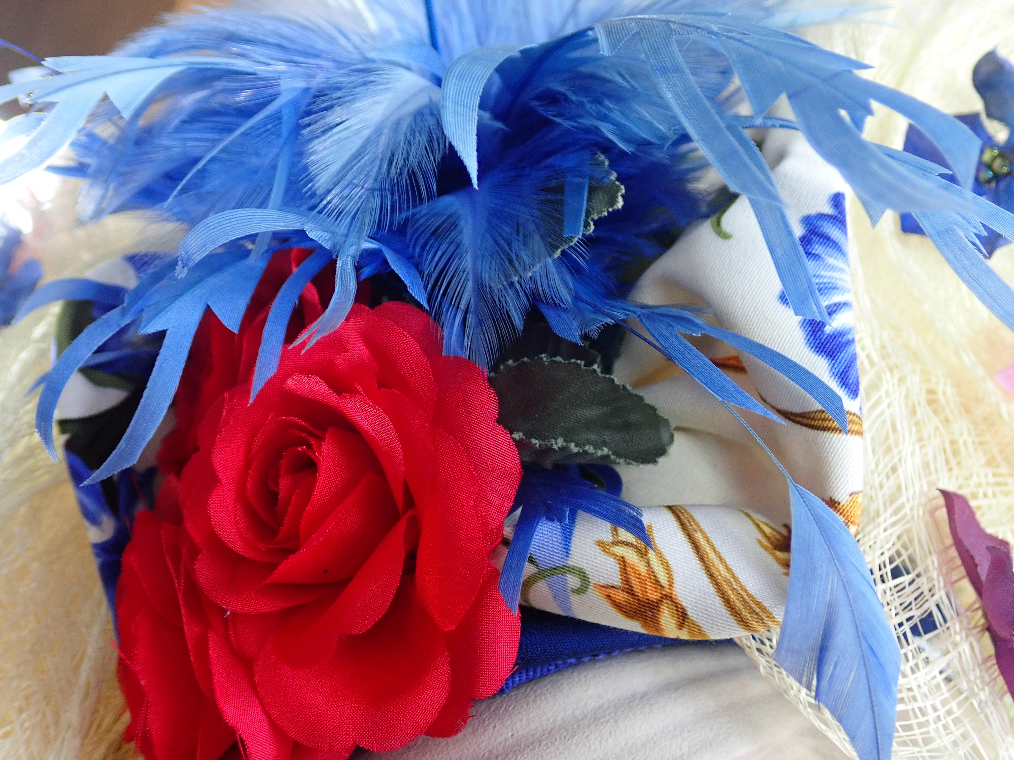 Womens Red, White, and Blue Fascinator Hat with Flowers and Blue Feathers