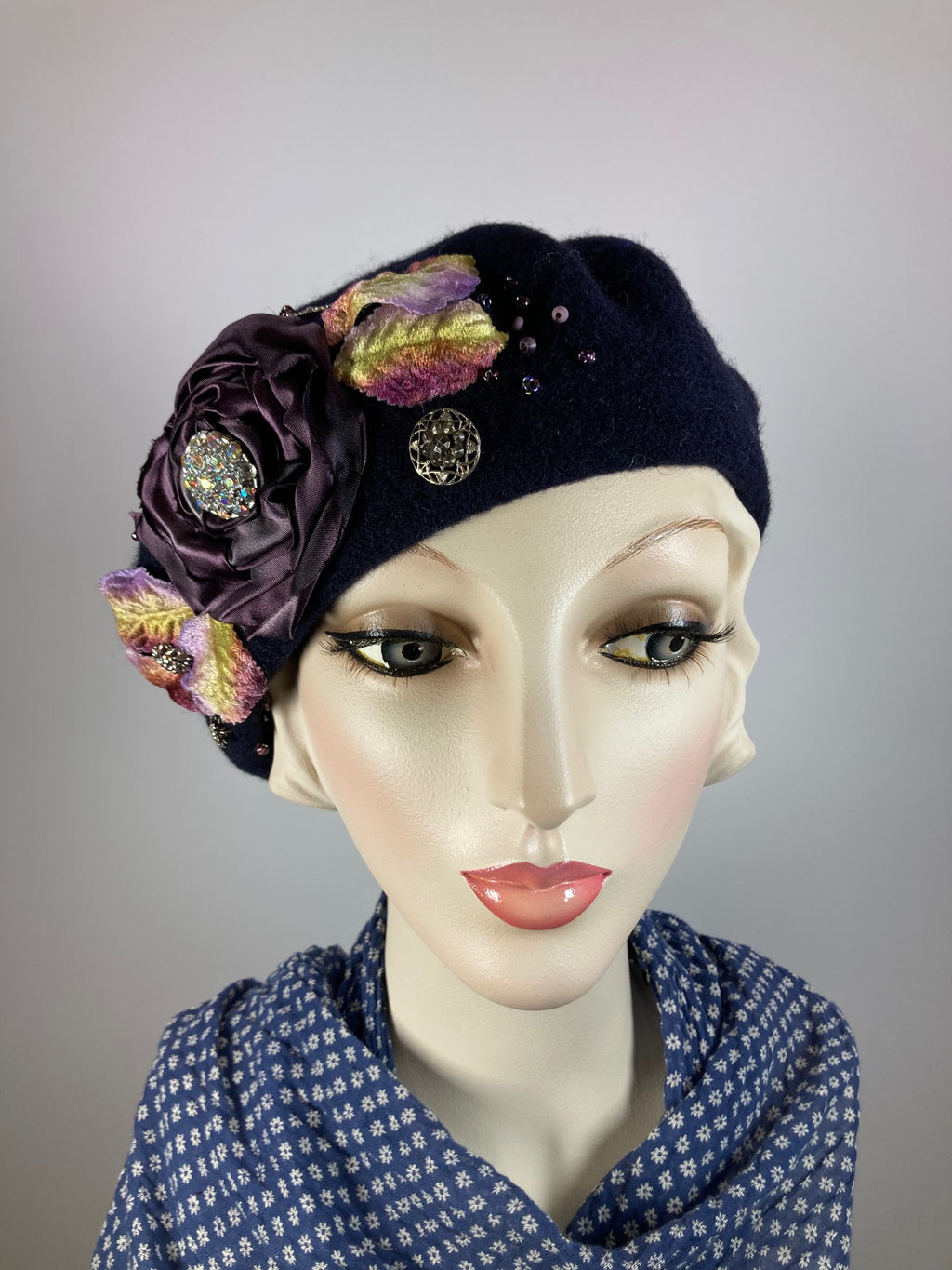 Navy blue wool felt French style beret with handmade silk flower, velvet leaves, glass beads and vintage buttons.