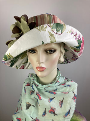 One of a kind upcycled floral sun hat. Handmade Wide Brim Women's Summer Sun Hat. Fabric summer brim hat for travel. Sustainable fashion.