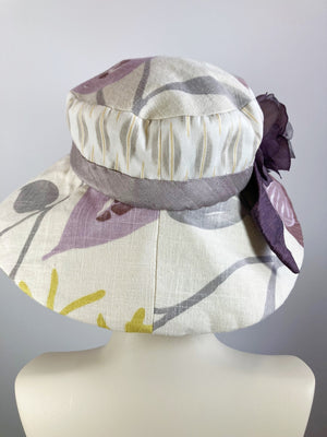 One of a kind floral sun hat. Handmade Wide Brim Women's Summer Sun Hat. Purple flower Ladies summer fabric hat. Travel brim hat.