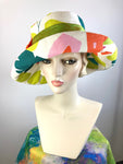 One of a kind vibrantly colored sun hat. Handmade Wide Brim Women's Summer Sun Hat. Colorful Ladies summer fabric hat. Fun Travel brim hat.
