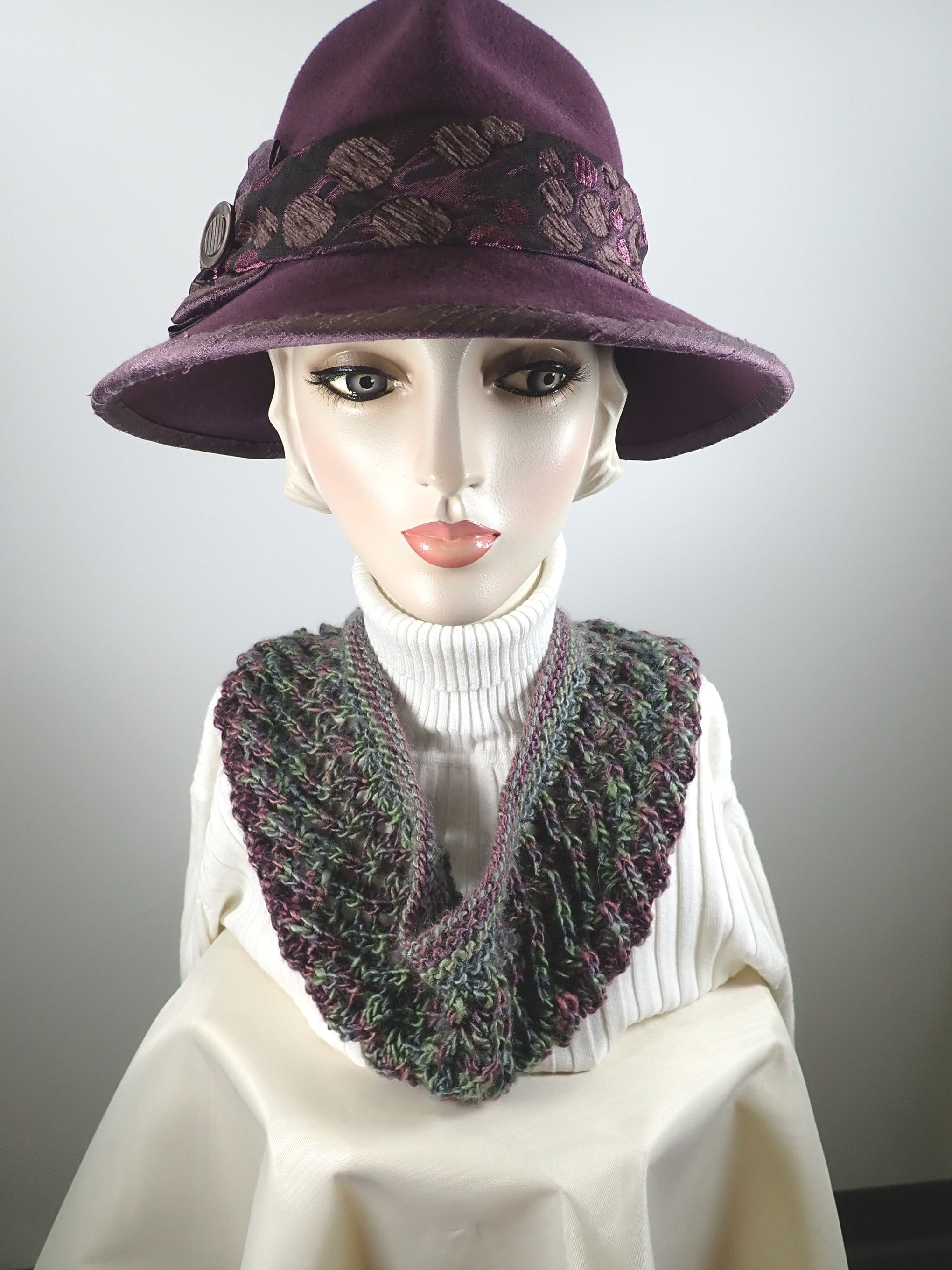 Hand knitted cowl scarf in purple and green