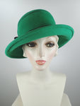 Green wool felt cloche hat with black embroidery and patent leather band