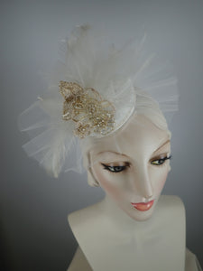 Off white bridal fascinator hat with hand crocheted bead and wire flowers